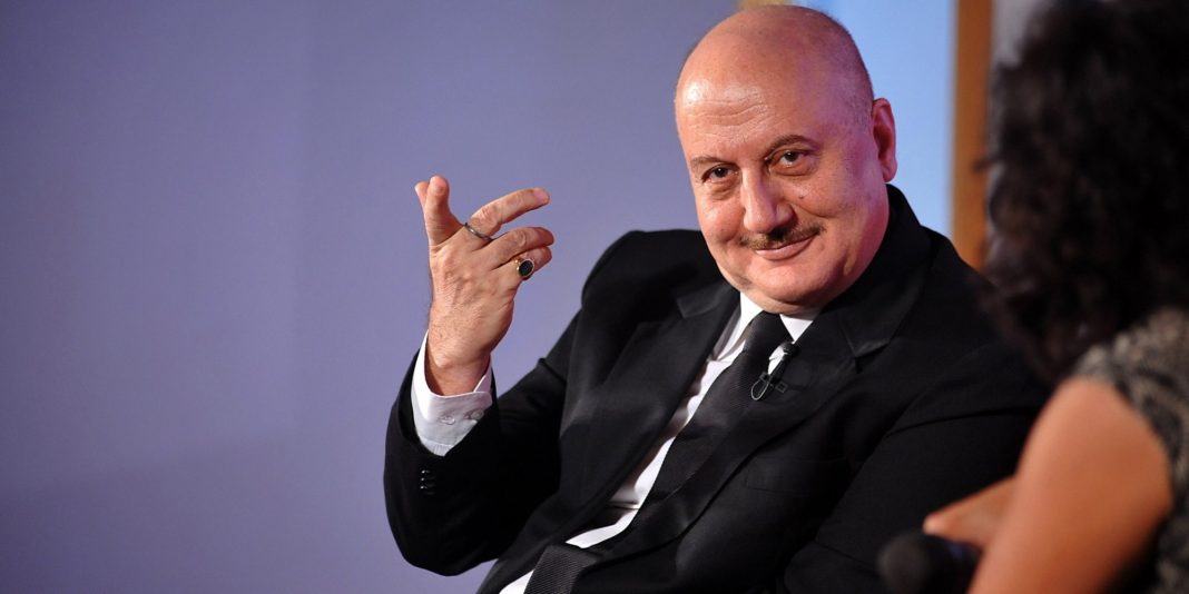 Indian Bollywood actor Anupam Kher announces season 2 of his show The Anupam Kher Show - Kucch Bhi Ho Sakta Hai' in Mumbai late on July 21, 2015. AFP PHOTO        (Photo credit should read STR/AFP/Getty Images)
